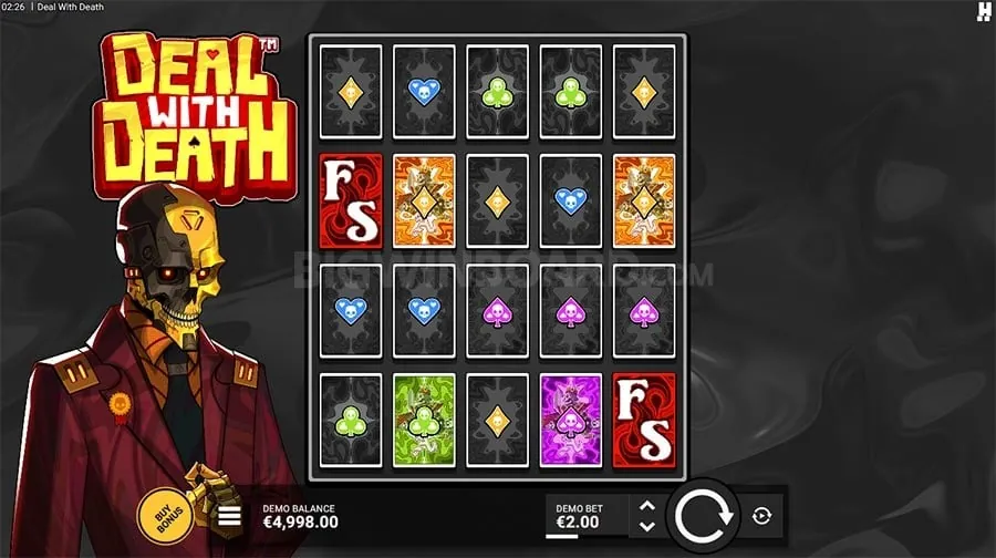 Hands holding Baccarat cards on a table